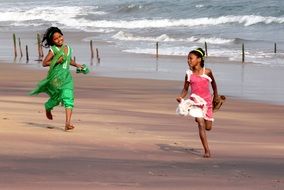 Girls Running on the beach