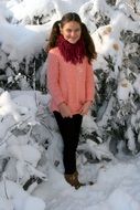 smiling girl in the snowy nature