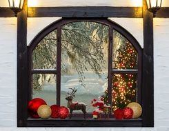 window with christmas attributes