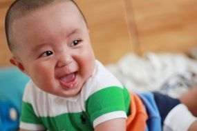 portrait of a happy asian baby