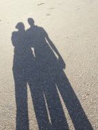 shadow of a couple in love on a sunny day