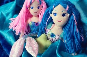 two dolls like mermaids