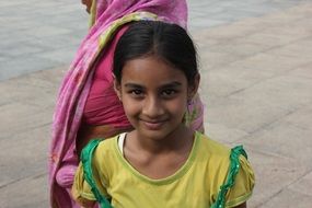 indian authentic girl in colorful clothes with smile