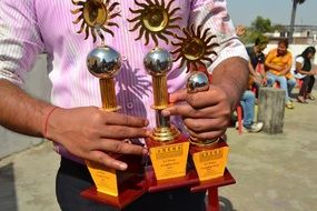 prizes in the hands of a happy winner