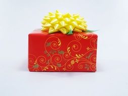 bright gift with a yellow big bow