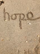 inscription hope on the sand
