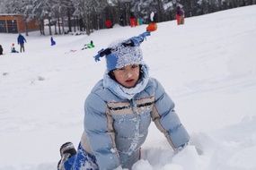 Child in Snow on Mountain side