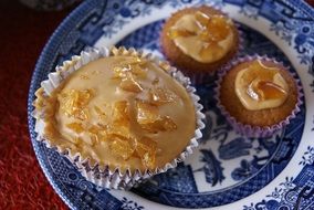 three cupcakes with caramel