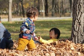 happy children in autumn park