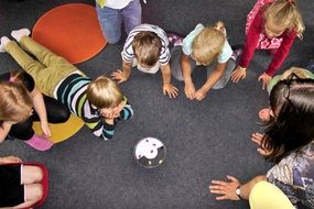 group of Children and woman Playing on floor