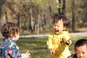 happy kids in the sunny park