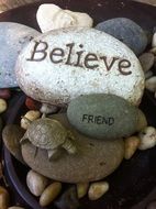 Believe like an inscription on a stone