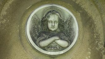 mourning Angel, relief on tombstone