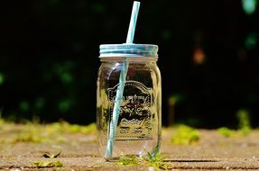 jar with a straw for a summer drink