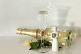 glass and bottle of champagne for a romantic holiday