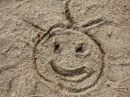 funny face in the sand in the sun