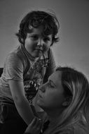 mother with baby in black and white background