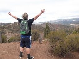 tourist at the peak of the mountain