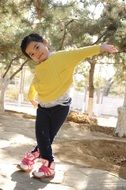 happy child posing in the forest