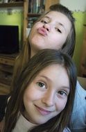 two cute girls posing