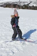 girl cross-country skiing on the slope