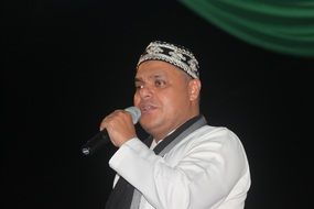 Haddad Alwi performs on stage