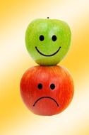 painted faces on apples