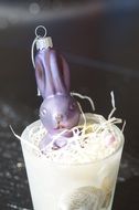 easter decoration in the straw in the glass