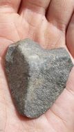 a stone in the shape of a heart