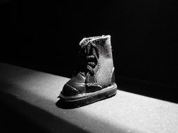 child Boot on dark background