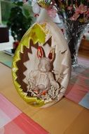 wooden bunny in the egg
