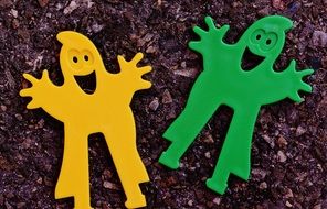 bright plastic ghosts on the pavement