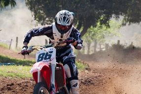 biker at high speed on race track
