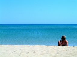 Person Relaxing on Beach at sea, italy, Sicily