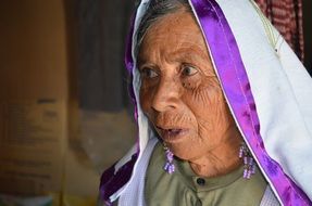 old woman in a scarf
