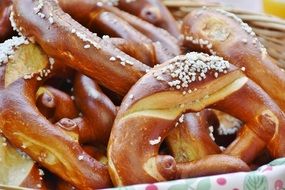 pretzels with sesame seeds in a plate