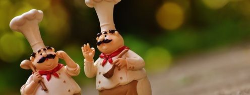 two funny figures of chefs