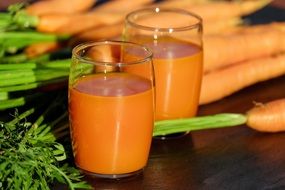 Glases with fresh Carrot juice