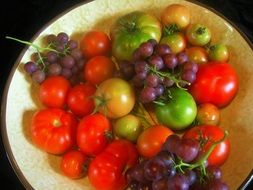 Organic fruits and vegetables in a bowl