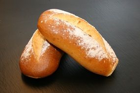 french rustic bread on a dark surface