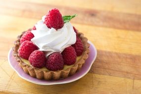 delicious dessert with natural raspberries and cream