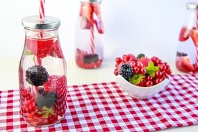 colourful Drink with fresh Berries on table