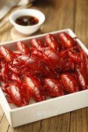 Fried Lobsters and sauce on table