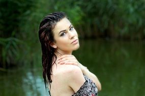 woman posing in the pond