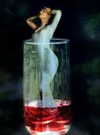 girl in a glass of wine