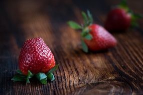 ripe strawberries on a wooden table