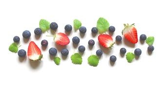 Strawberries and Blueberries on white