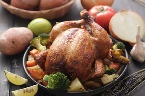 roasted chicken with spices and vegetables