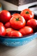 ripe tomatoes in a bowl