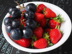 fruit plate with grapes and strawberries